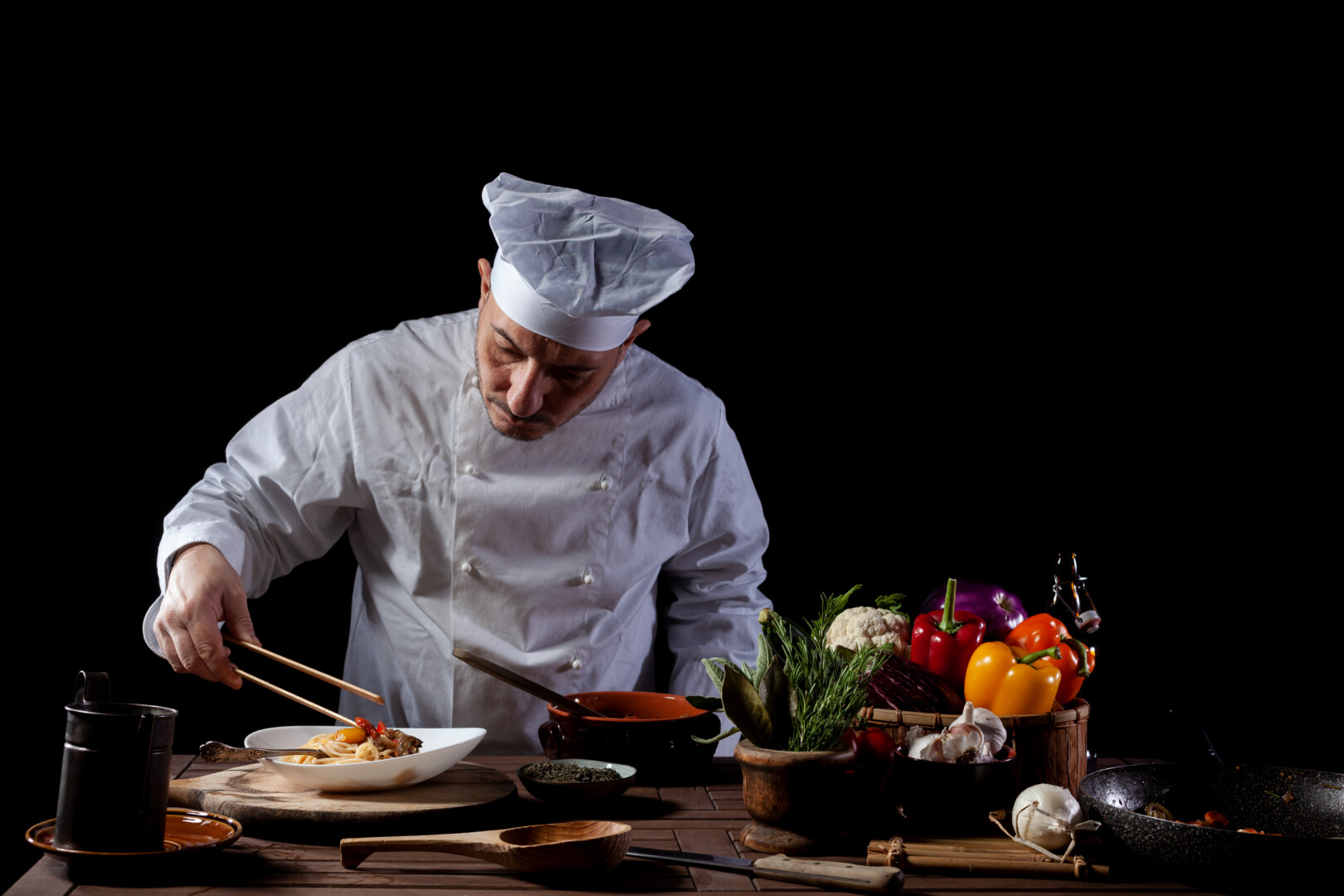 Chefs crafting Montmartre cuisine with passion and artistry